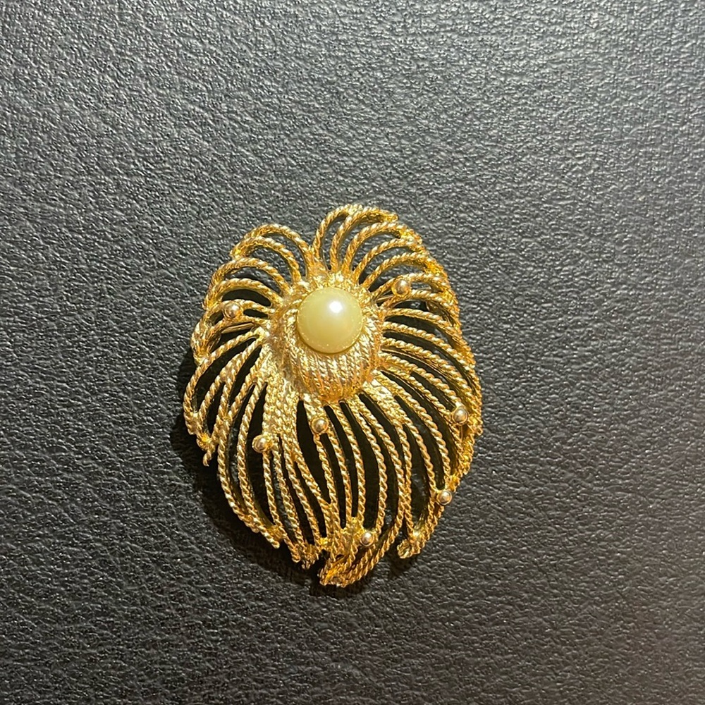 Caroline gold tone brooch with faux pearl